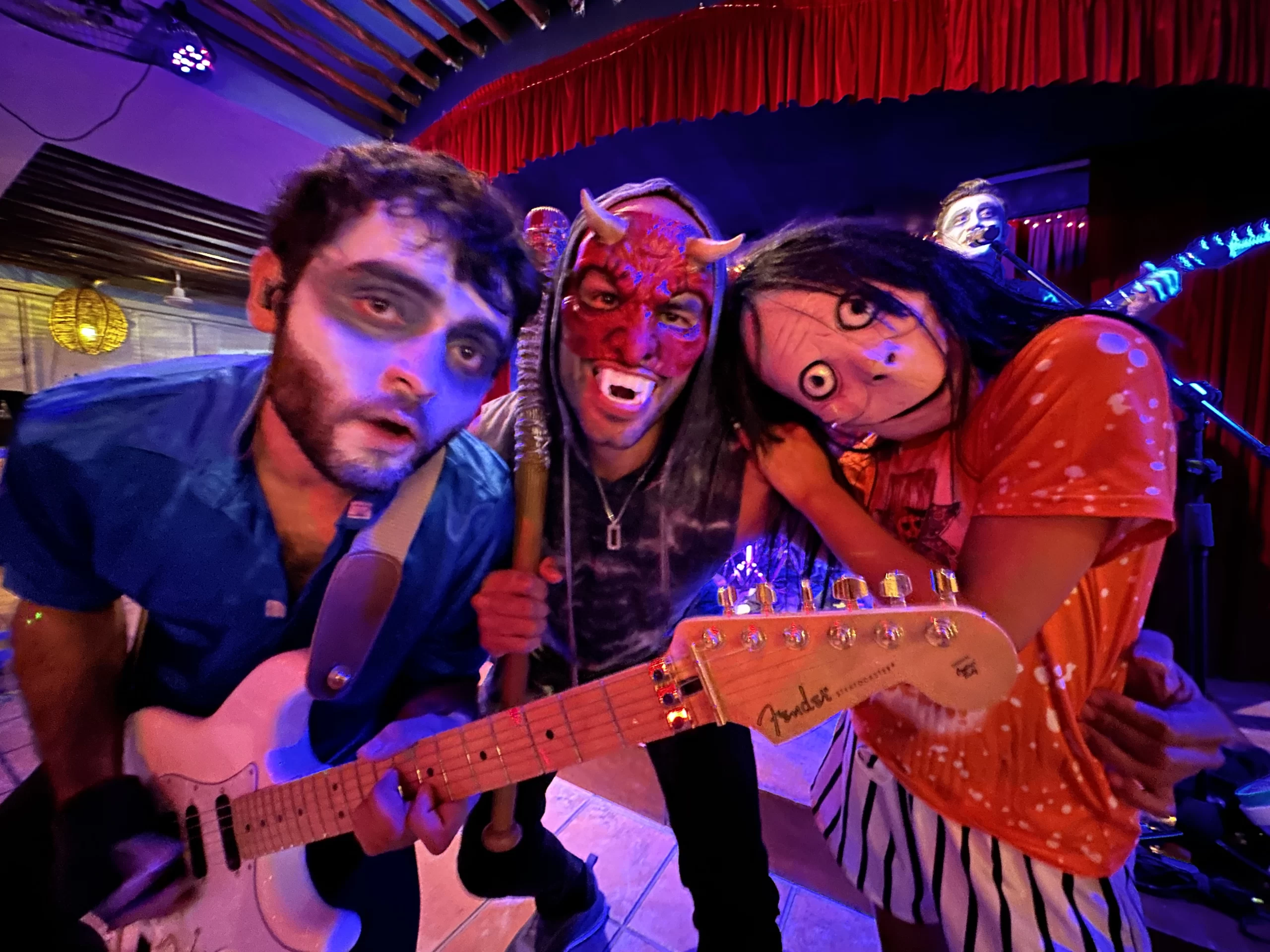 Image of 3 people dressed up in costumes at the La Sirena Puerto Morelos Halloween Party 2022.