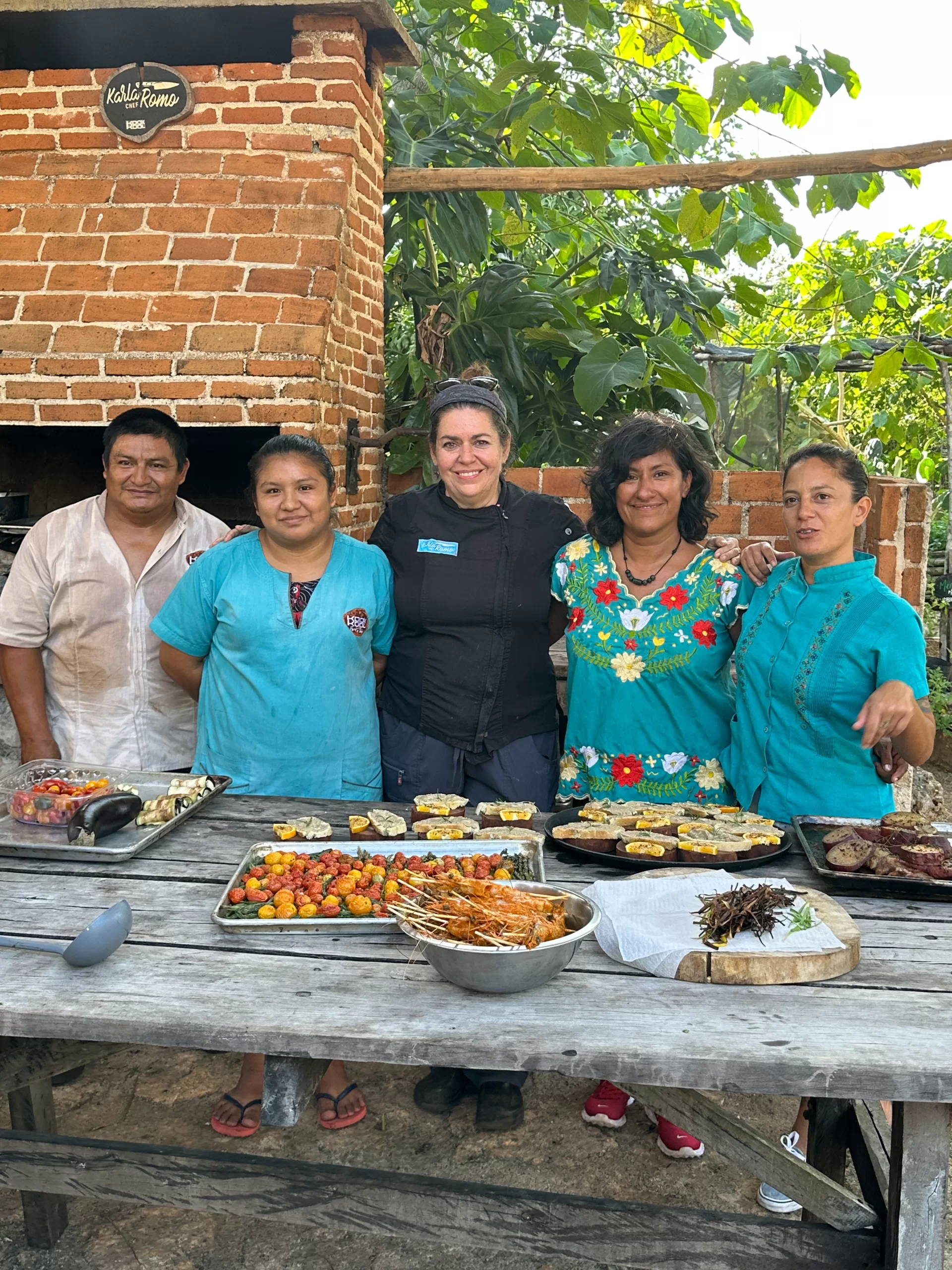 Chef Karla Romo and three women and one man on her team at KIK.