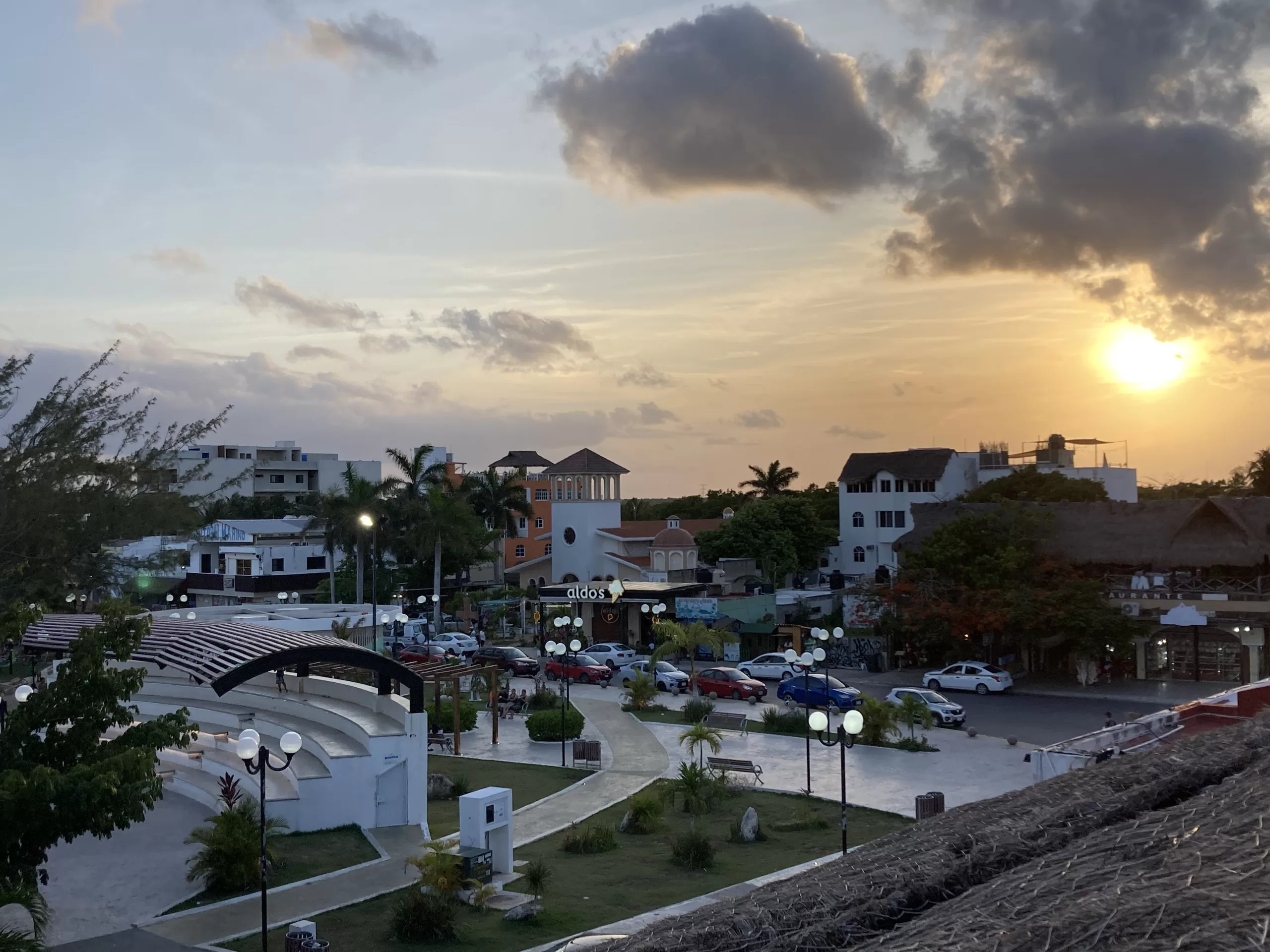 Sunset view of Puerto Morelos central park from La Sirena rooftop.